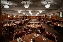 Period drama-inspired interiors with communal seating