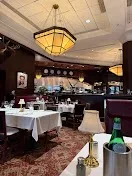 Clubby, refined setting with private dining options