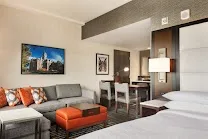 Spacious, warm contemporary rooms and suites