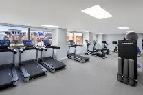 24/7 exercise room with comprehensive equipment