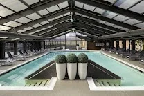 Indoor pool with controlled access