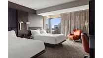 Floor-to-ceiling windows with river views