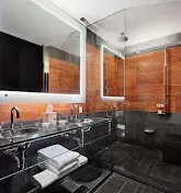 Modern bathrooms with rainfall showers and advanced fixtures