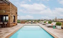 Seasonal rooftop pool and bar