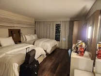 Thoughtfully designed rooms with premium bedding and relaxing features