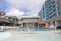 Pool and rooftop bar with ocean views