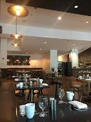 Sleek French restaurant with bar