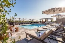 Rooftop pool and bar with city views