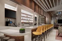 On-site bar and fitness room