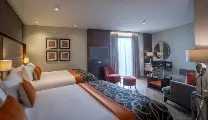 Comfort-focused rooms with deluxe and suite options