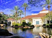 Resort-style pool with waterfall