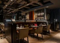 The Grill: warm restaurant with elevated comfort food