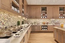 Well-equipped fitness center and complimentary breakfast