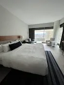 Understated rooms with city views and modern bathrooms