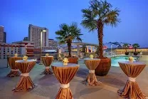 Indoor and rooftop outdoor pools with hot tub