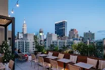 Rooftop bar with city skyline views