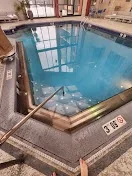 Two outdoor pools and a fitness center