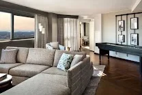 Spacious rooms with city skyline vistas