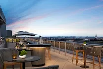 Sophisticated rooftop bar with city views