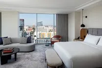 Spacious rooms with city views and private balconies