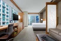 Spacious rooms with large windows and city views
