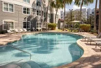 Outdoor pool and gym facilities