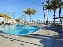 Three resort-style pools with bayside views