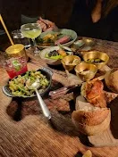 Standout dishes including Brillat-Savarin and Valserena Parmigiano cheeses