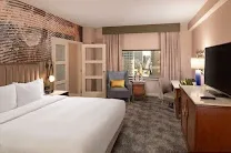 Upper-floor rooms with downtown skyline views