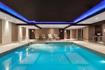 Indoor pool and sauna for guest relaxation