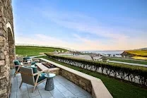 Terraces with gas fire pits overlooking the ocean