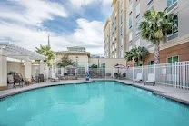 Outdoor pool and gym on site