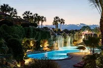 Extensive pools with unique cave feature and waterslides