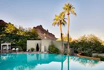 Infinity pool and multiple pools with mountain views