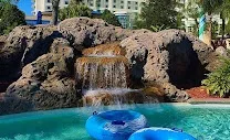 Two outdoor pools plus a lazy river