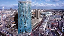Glass high-rise with city views