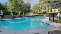 Large swimming pool with outdoor fountains