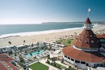 Beachfront setting with multiple outdoor pools and dining