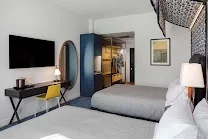 Sleek, modern rooms with high ceilings