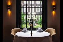 Intimate private rooms for up to 14 guests