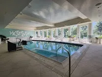 American dining and sports bar with indoor pool and fitness center