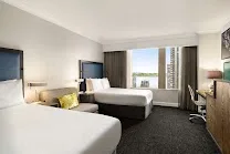 Sleek, well-designed rooms with skyline views