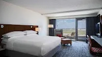 Runway-View Rooms with Private Balconies