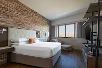 Stylish rooms with desert landscaping and murals