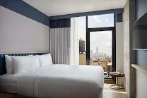 Modern, efficient rooms with city skyline views