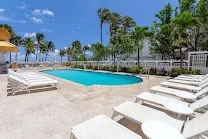 Outdoor pool and poolside bar with gelateria
