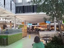 Food court with 15+ popular fast dining options plus sit-down restaurants
