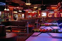 Modern bowling lanes paired with a lively arcade