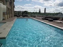Seasonal rooftop pool with bar