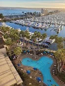 Three outdoor pools with fire pits and cabanas